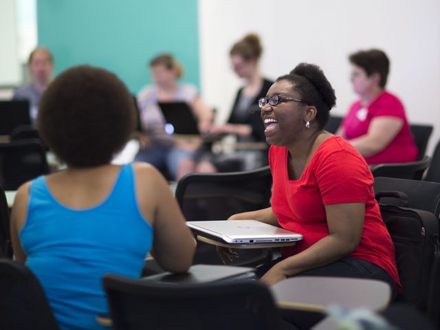 LaunchCode learners laughing together in class